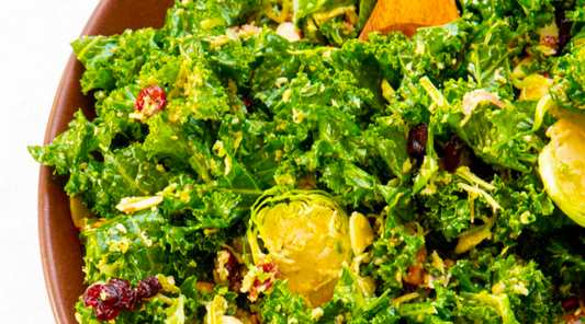 Kale and Shaved Brussels Sprouts Salad with This Little Goat went to Belize Spiced Vinaigrette